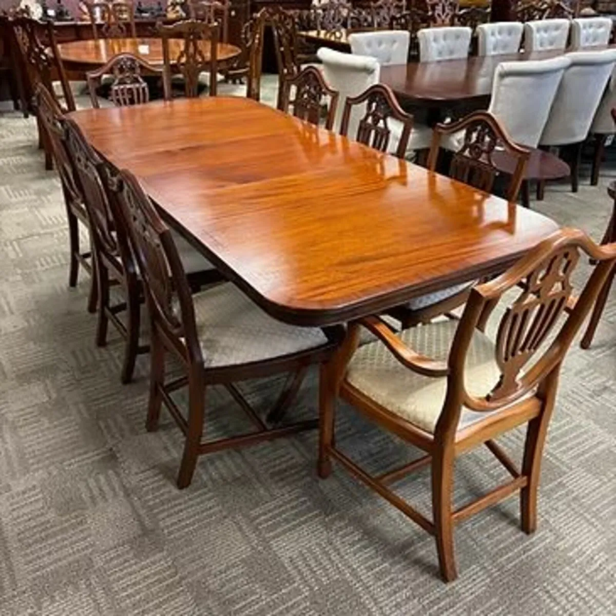Fabulous mahogany flamed extendable dining with 8