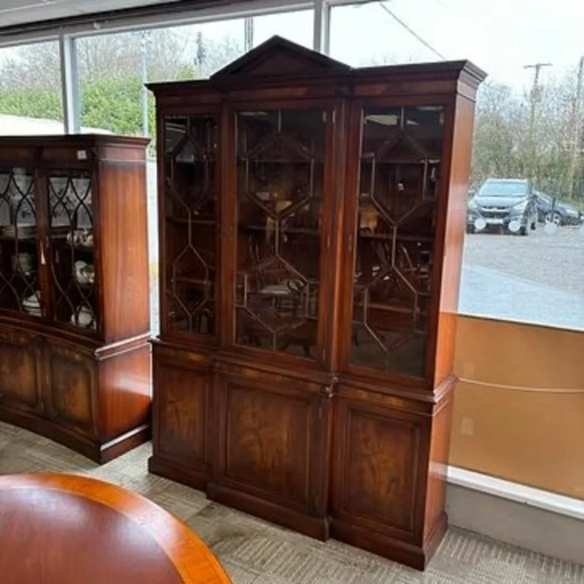 Fabulous mahogany flamed breakfront display cabine