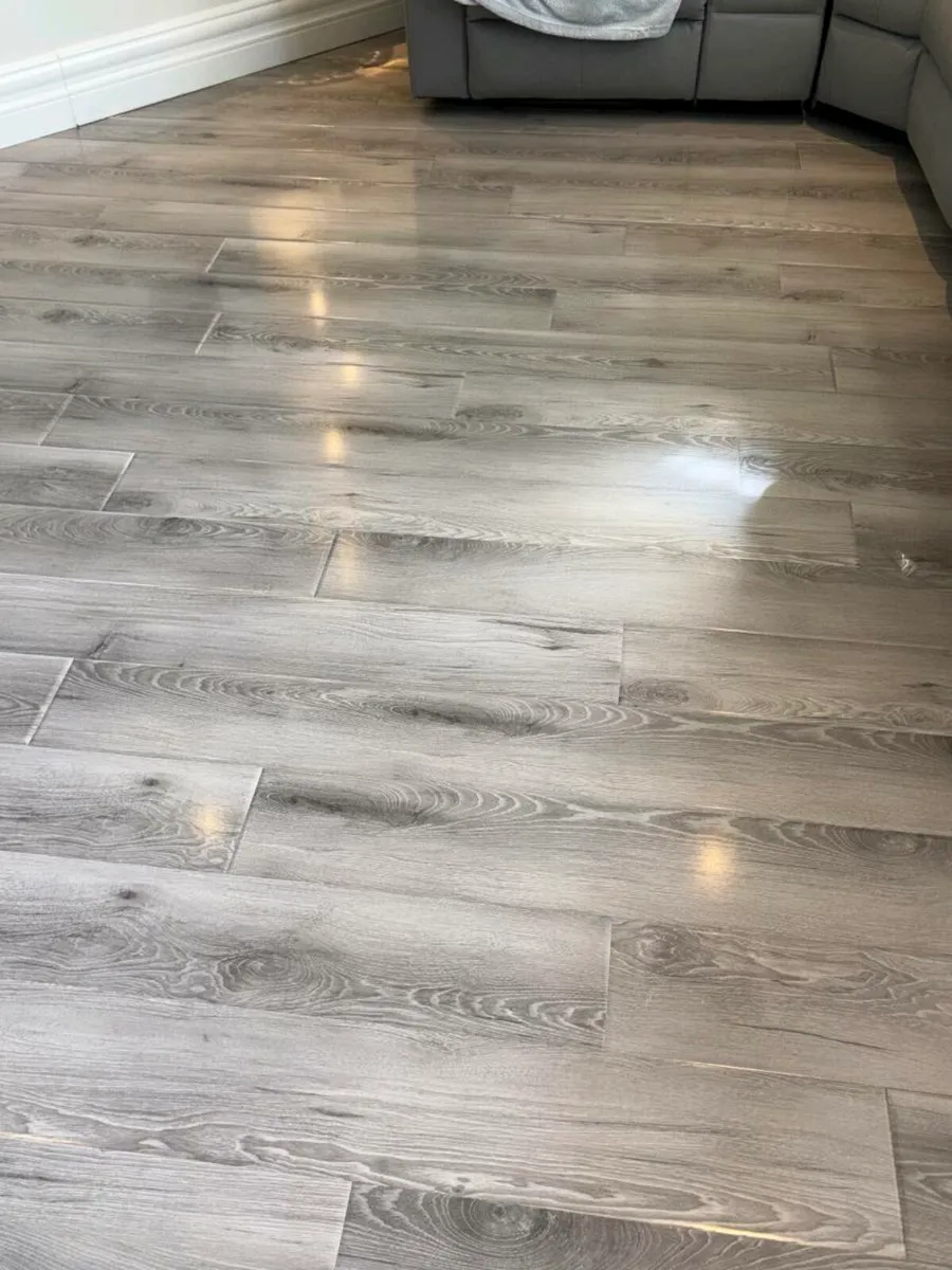 Brand new 12mm high gloss flooring - Image 2
