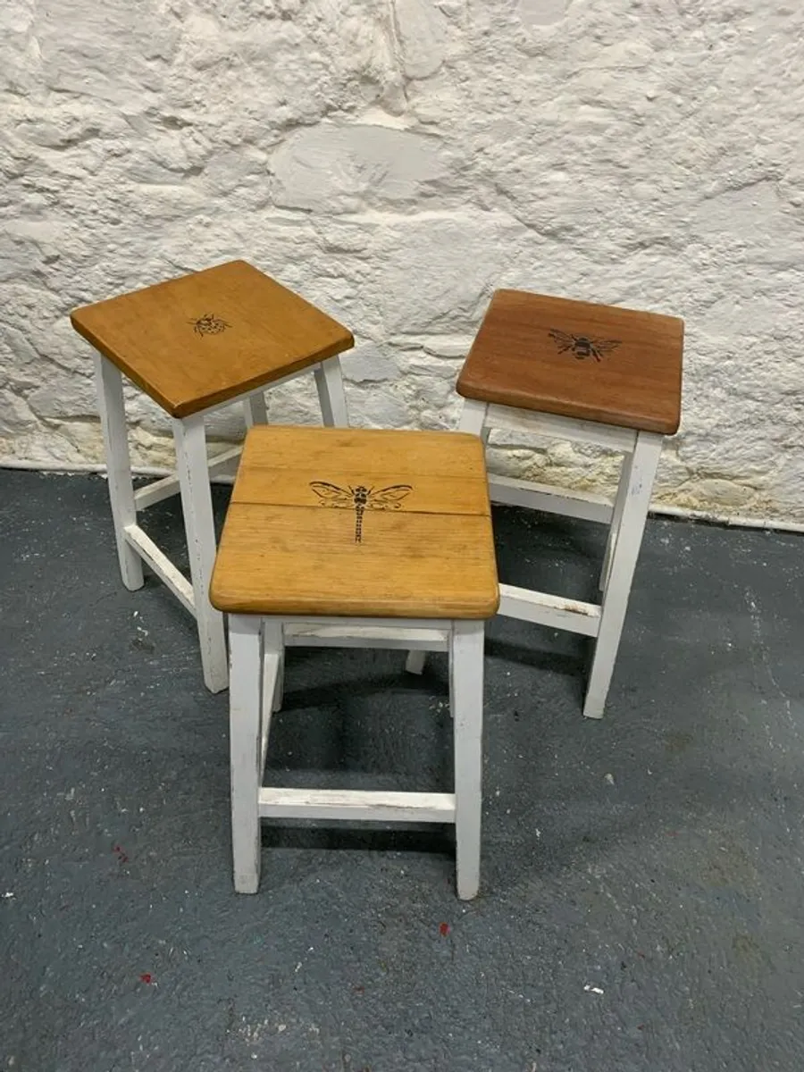 Set of three vintage wooden stools. - Image 1