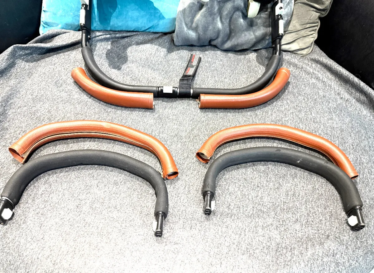 Bugaboo Donkey tan leather covers in Swords