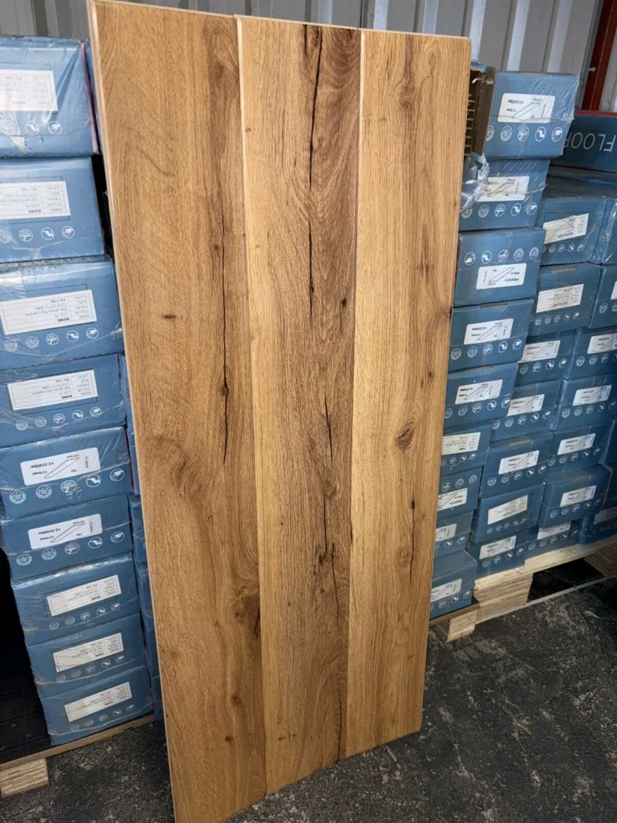 Brand new 12mm high gloss flooring - Image 1