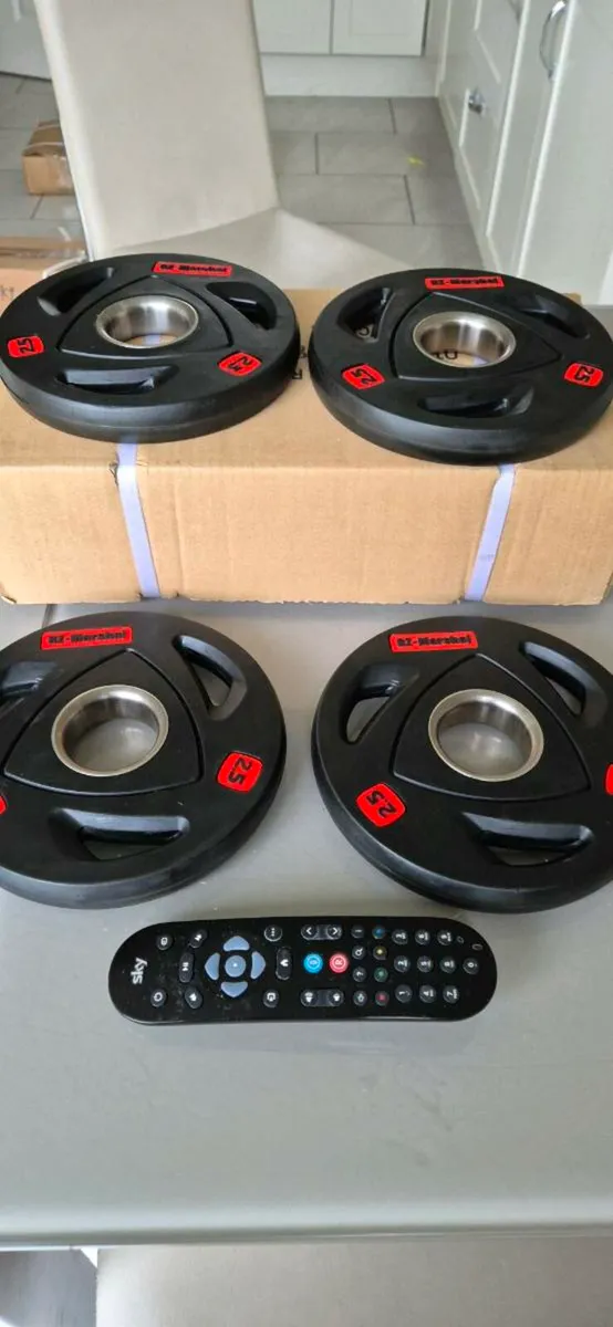 Brand new 4x2.5 kilo Olympic weight plates - Image 1
