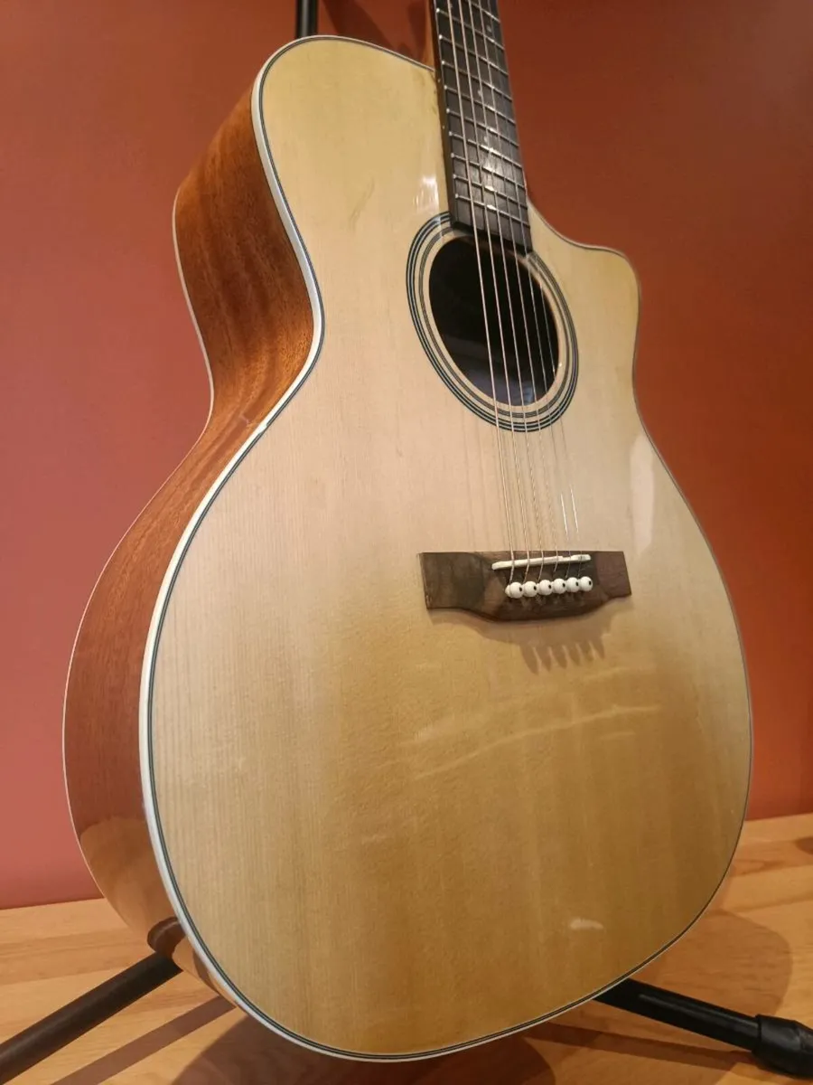 Acoustic Guitar + 2 Home Lessons + Accessories - Image 1