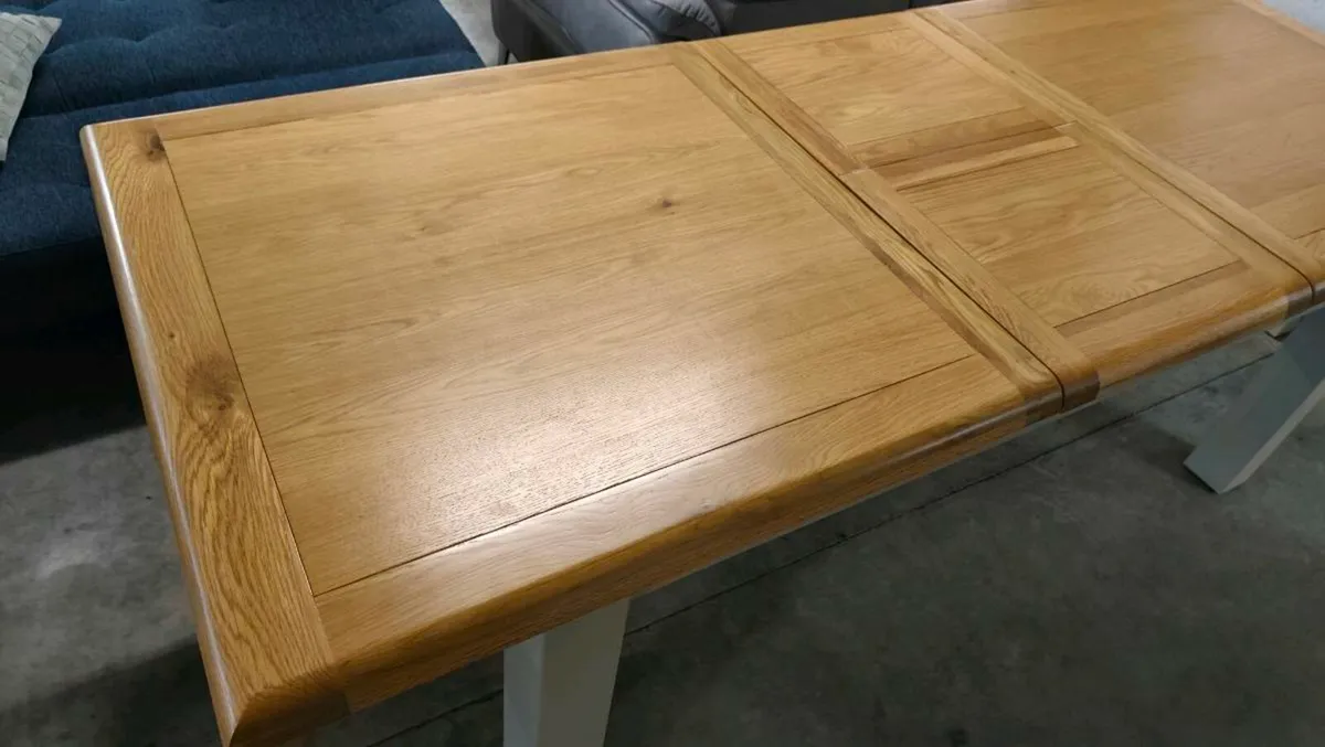 Oak Dining Table Ex Display Like New - Image 1