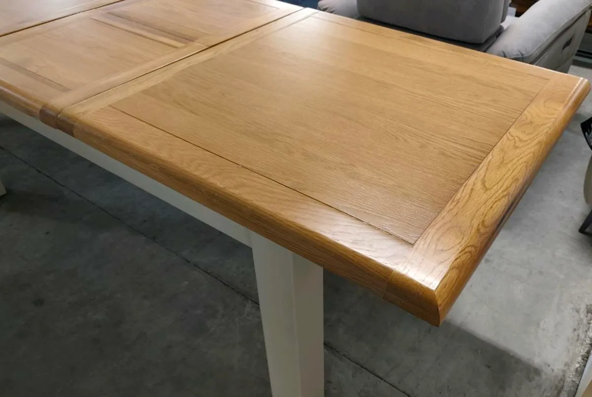 Extending Oak Dining Table Ex Display Like New - Image 1