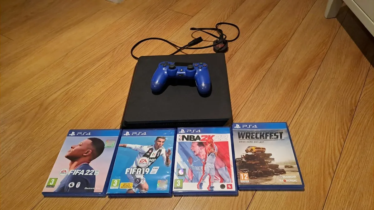 Playstion 4 with one controller and four games - Image 3