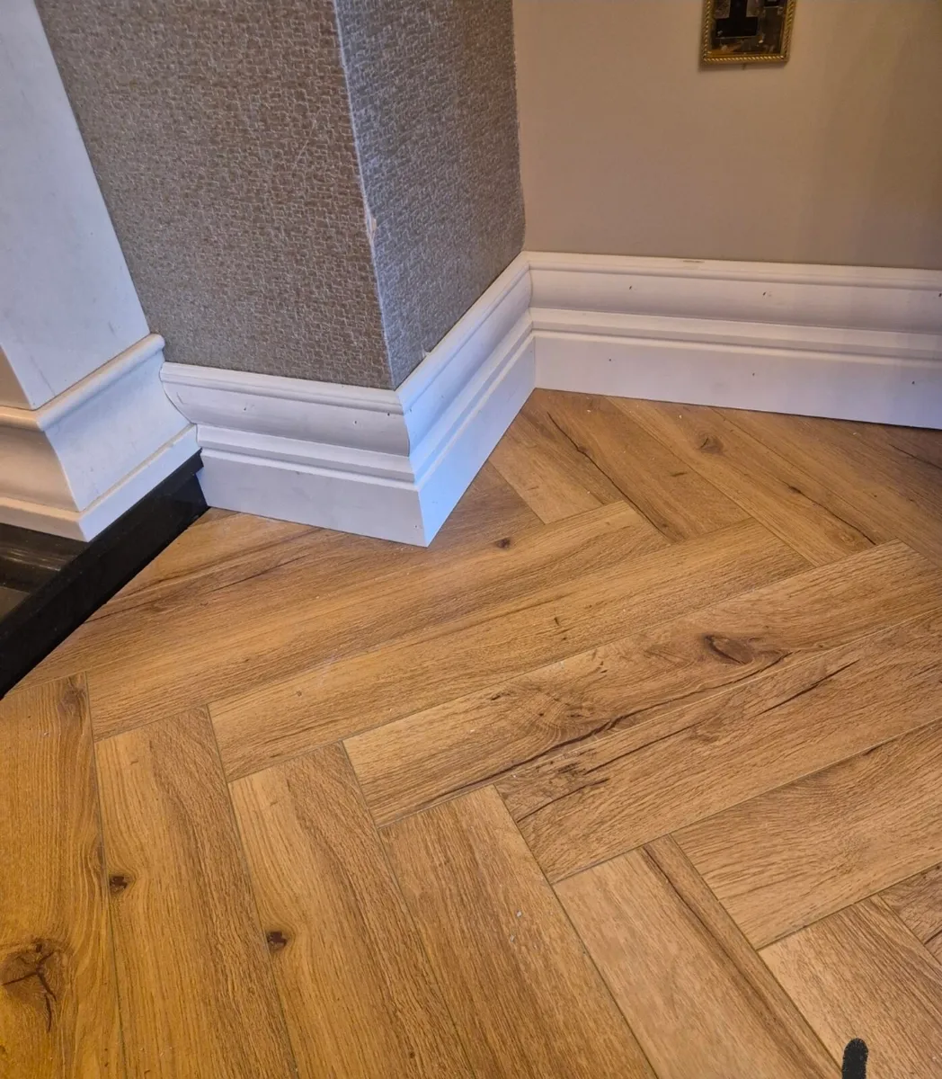 Laminate flooring and timber flooring - Image 1