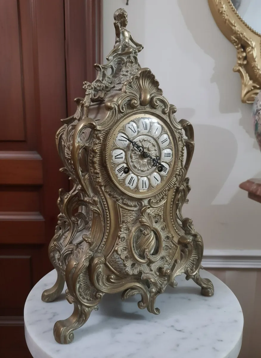 Antique brass clock POSTAGE AVAILABLE