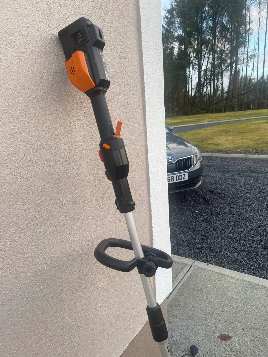 Strimmer and saw, batteries and charger - Image 2