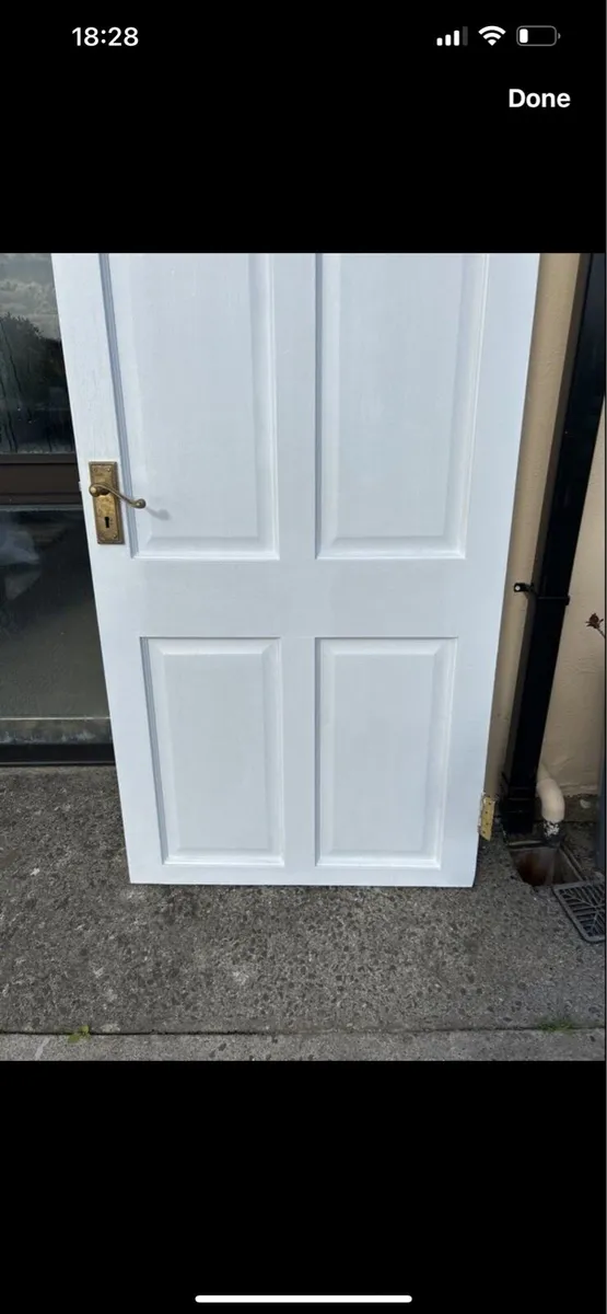 Pine interior door painted white - Image 1