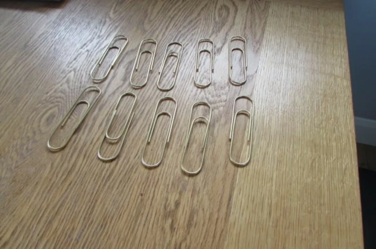Large Gold and White Plastic Coated Paperclips - Image 1