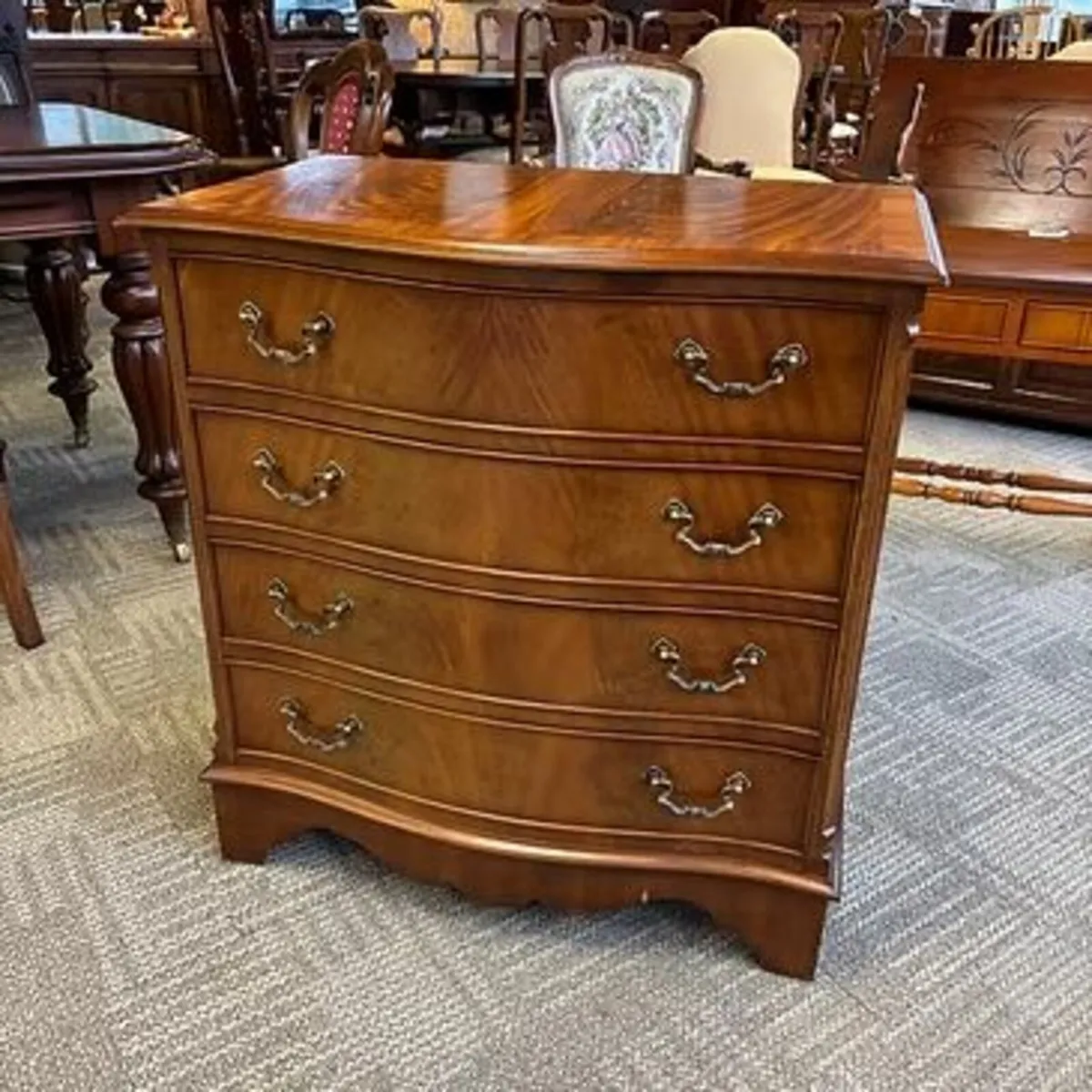 Fabulous mahogany flamed chest of drawers. Bow fro