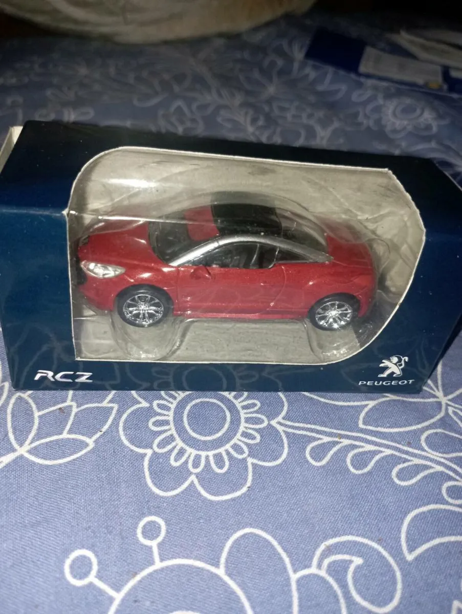 PEUGEOT RCZ RED DIE-CAST  MODLE  1-64 SCALE - Image 1