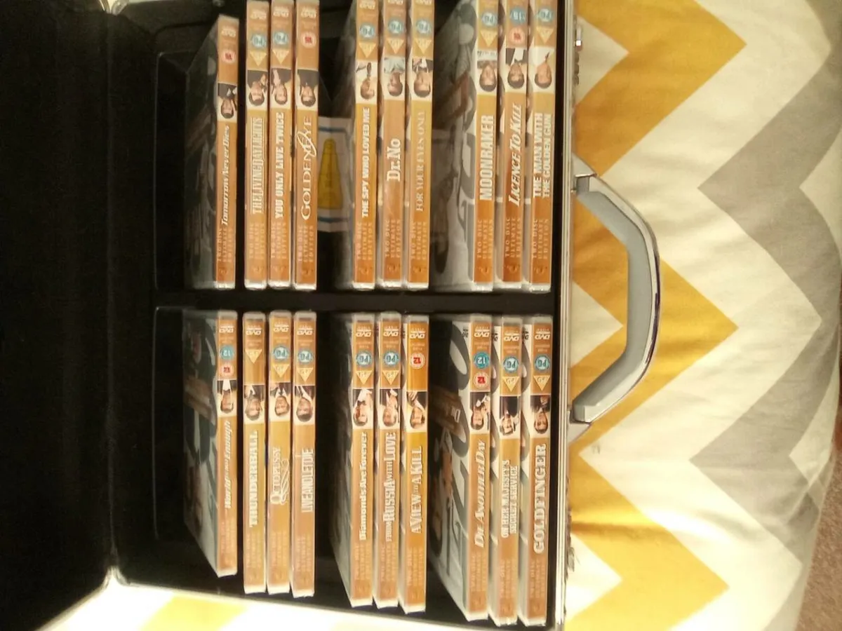 20.  JAMES. BOND.  D.V.D.S.  IN.  DISPLAY.  CASE - Image 4