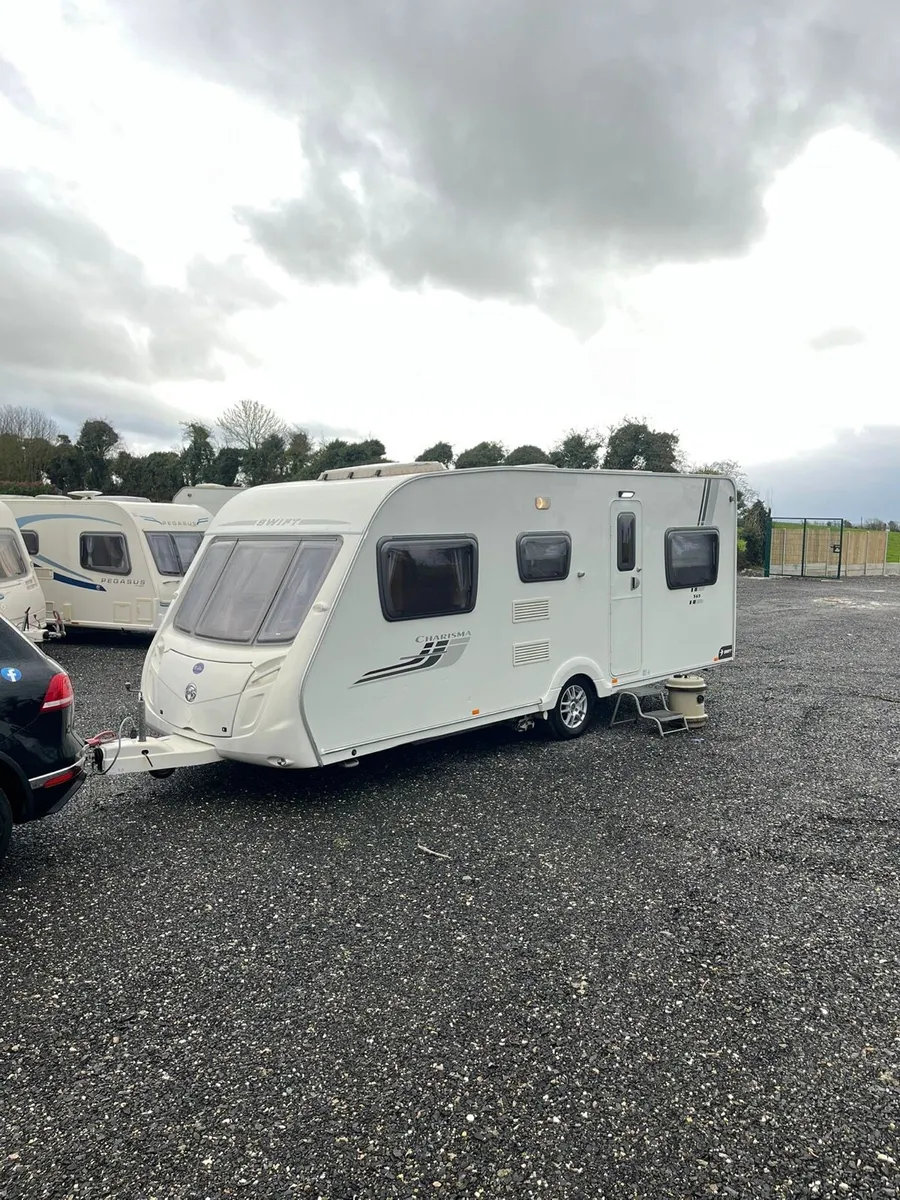 Swift 6 Berth Fixed Triple Bunk Caravan For Sale - Image 1