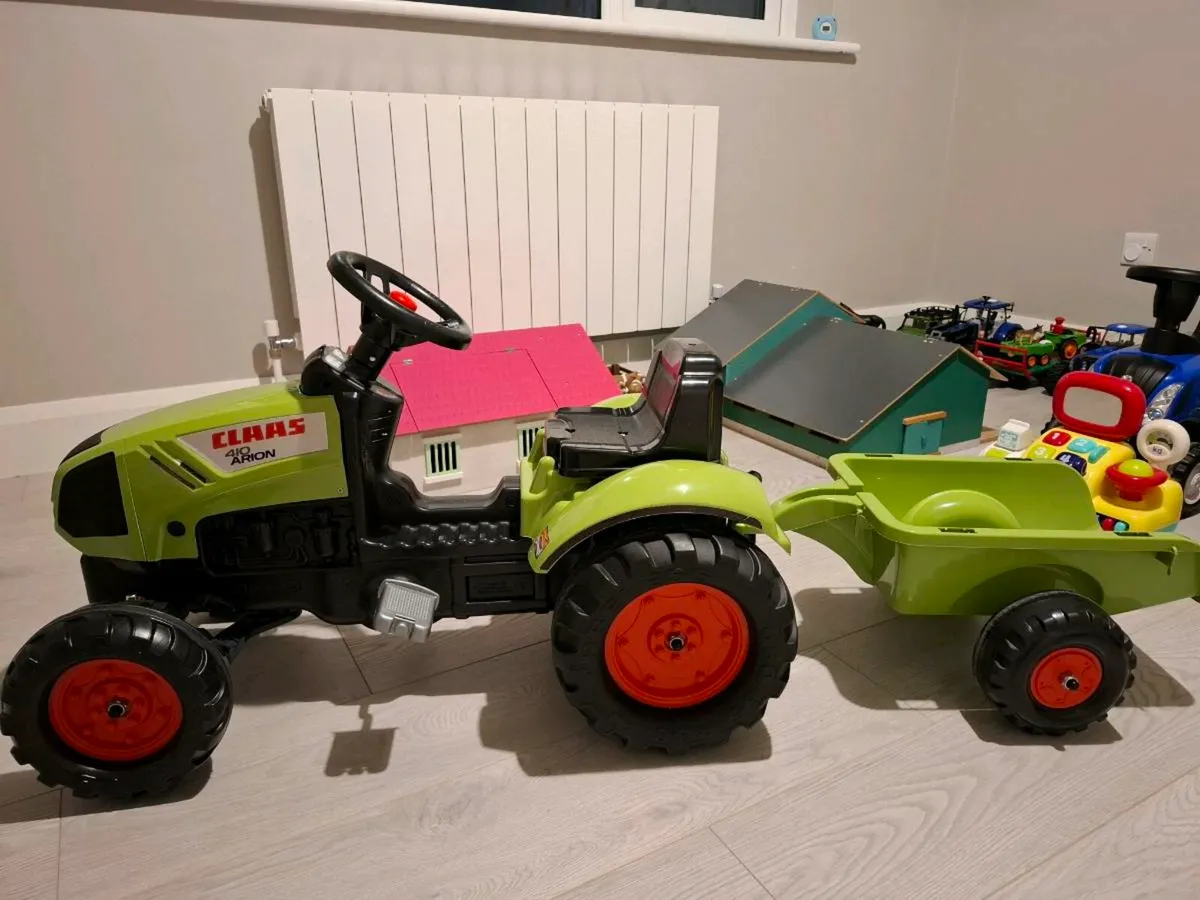 Claas tractor and trailer - Image 1