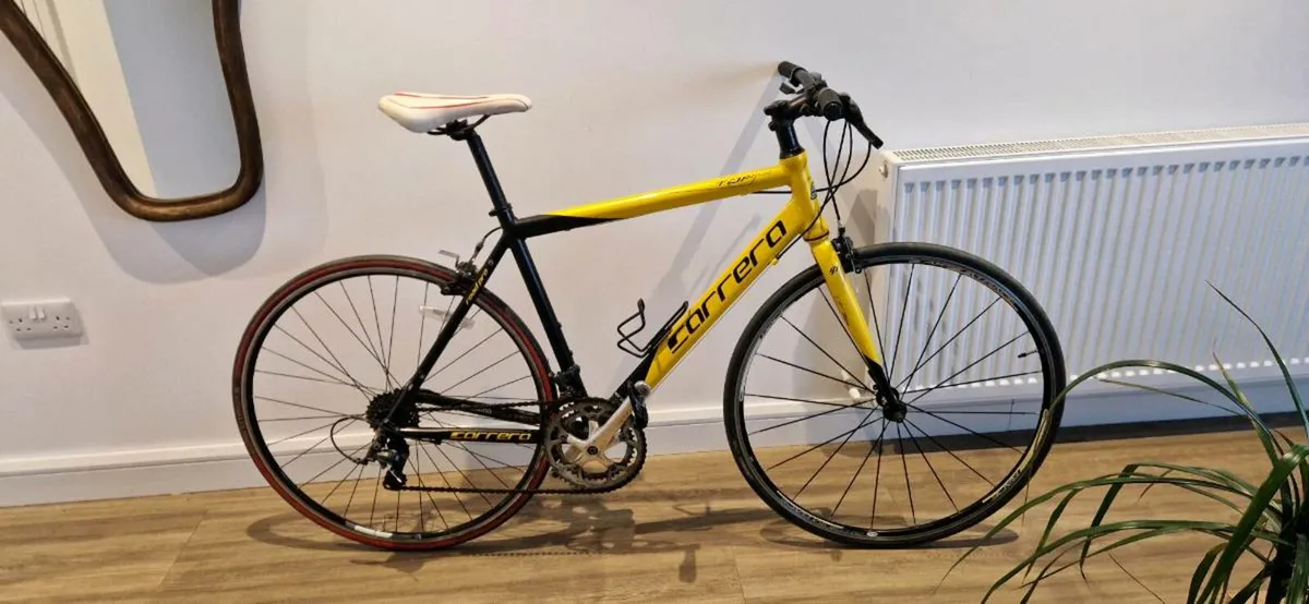 Carrera flat bar road bike (delivery)(serviced) - Image 1