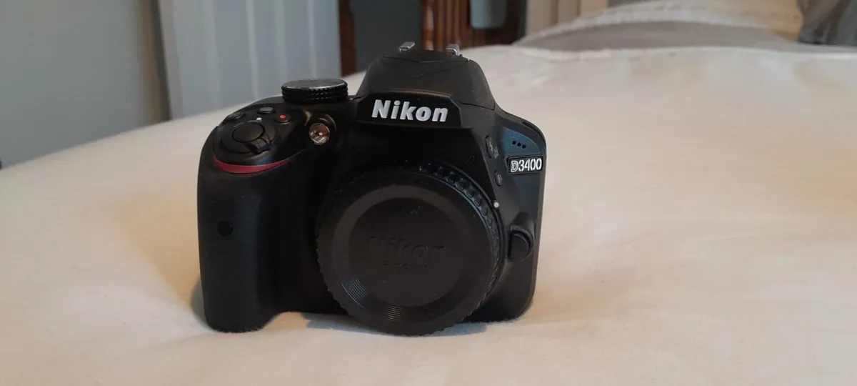 Never used Nikon D3400 with bag and cleaning kit - Image 1