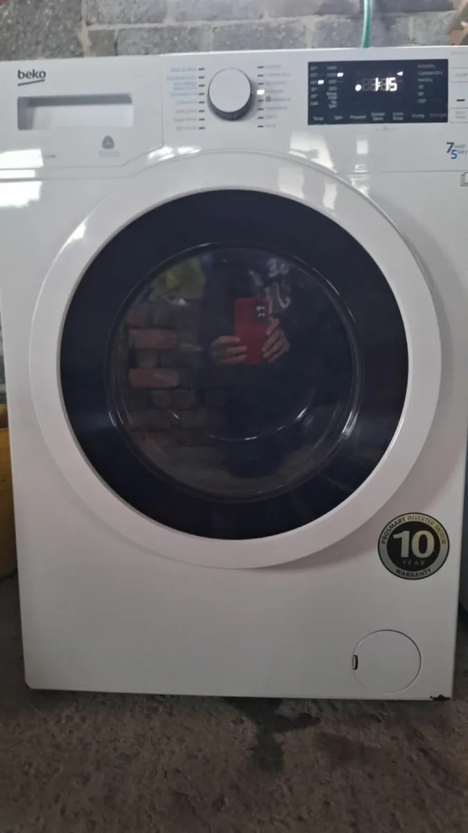 Washing machine and dryer - Image 1