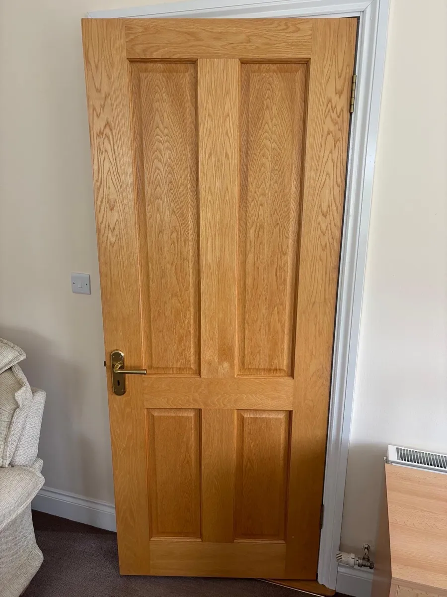 Oak raised 4 panel internal doors - Image 1