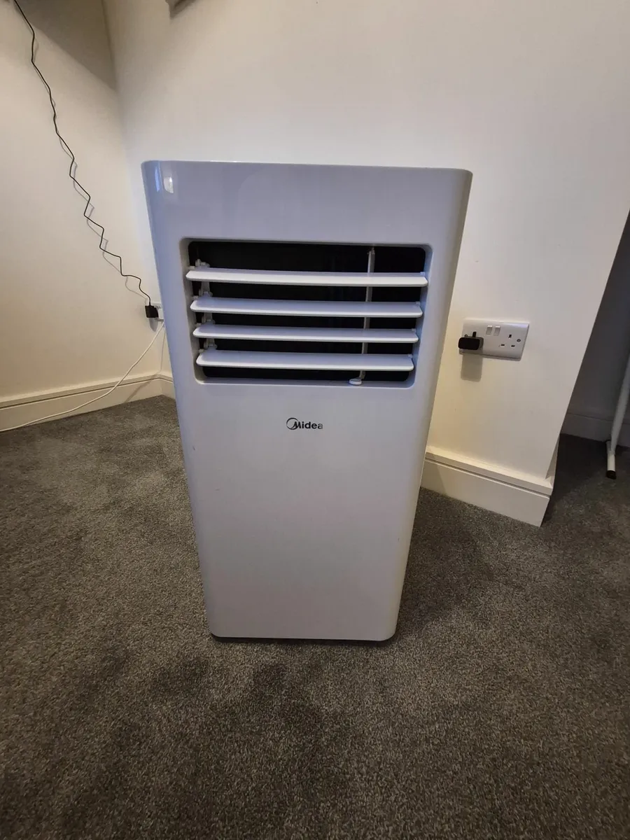 Midea Air Conditioning Unit - Image 1