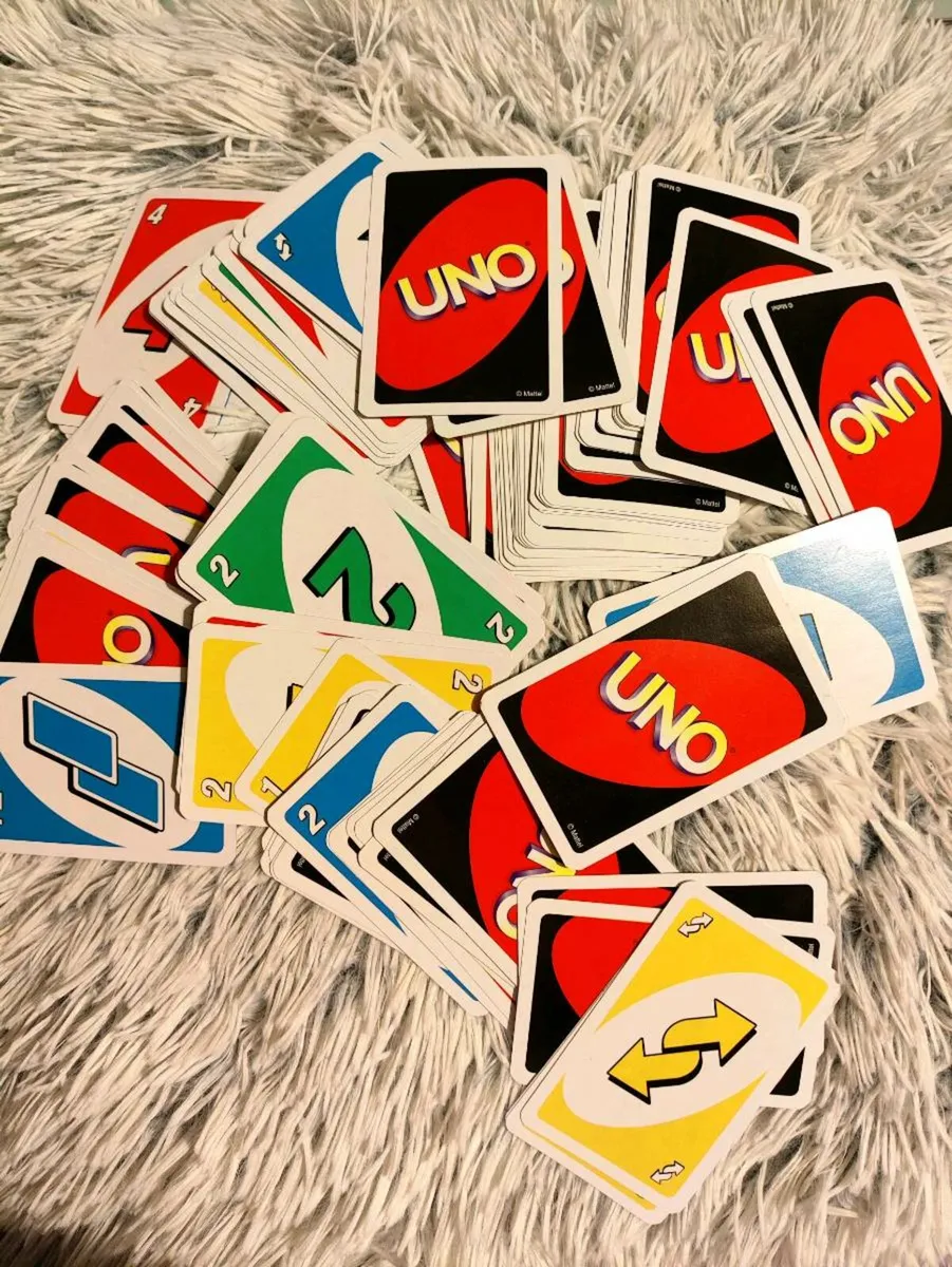 Classic UNO Card Game – Family Fun in a Box - Image 2