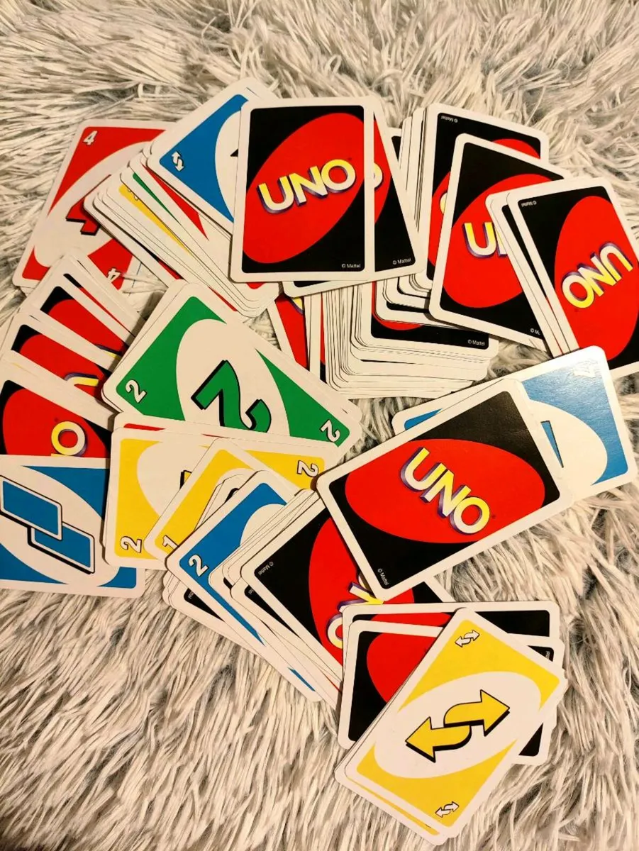 Classic UNO Card Game – Family Fun in a Box - Image 4
