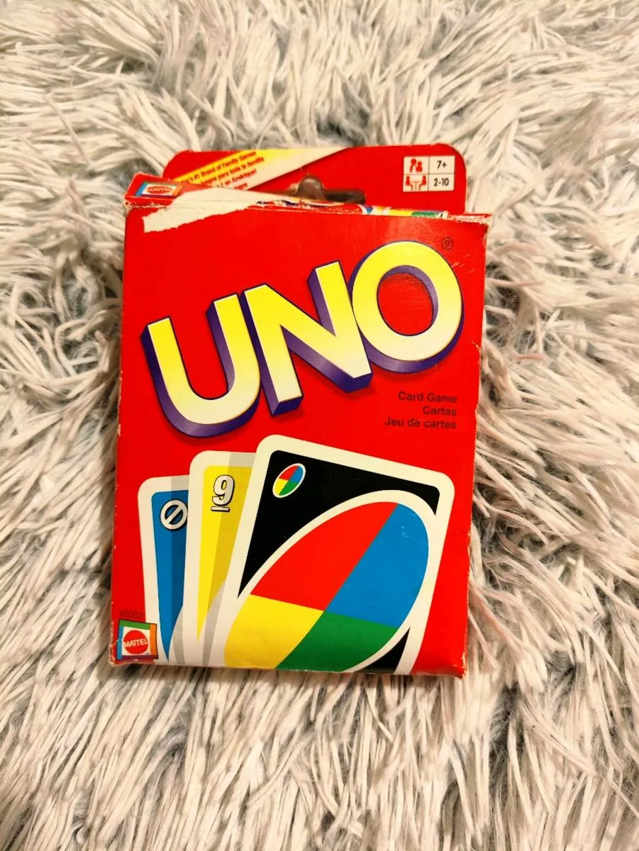 Classic UNO Card Game – Family Fun in a Box - Image 1