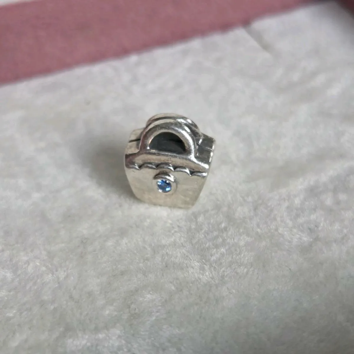 Genuine Pandora purse charm with small blue stone - Image 1