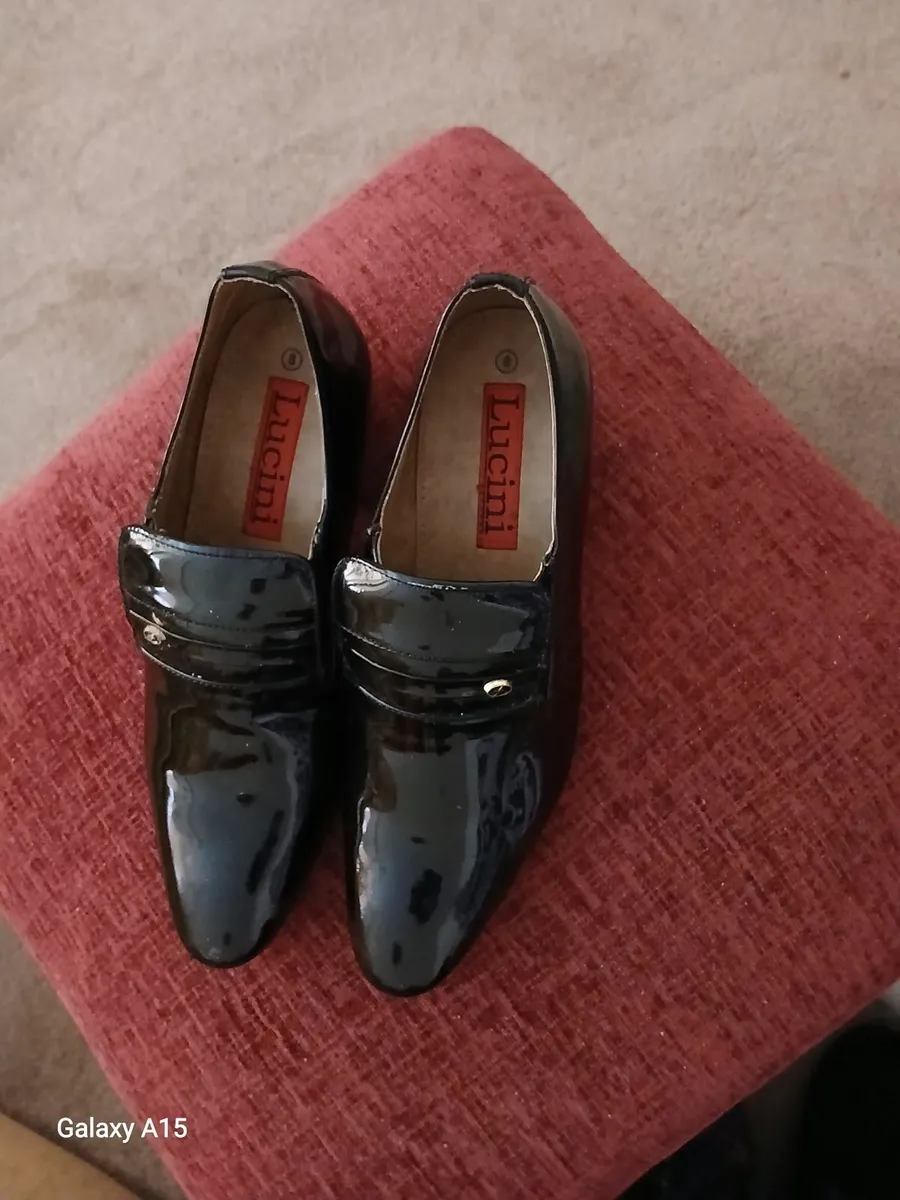 Black leather Lucini Mens  New dress es never worn - Image 1