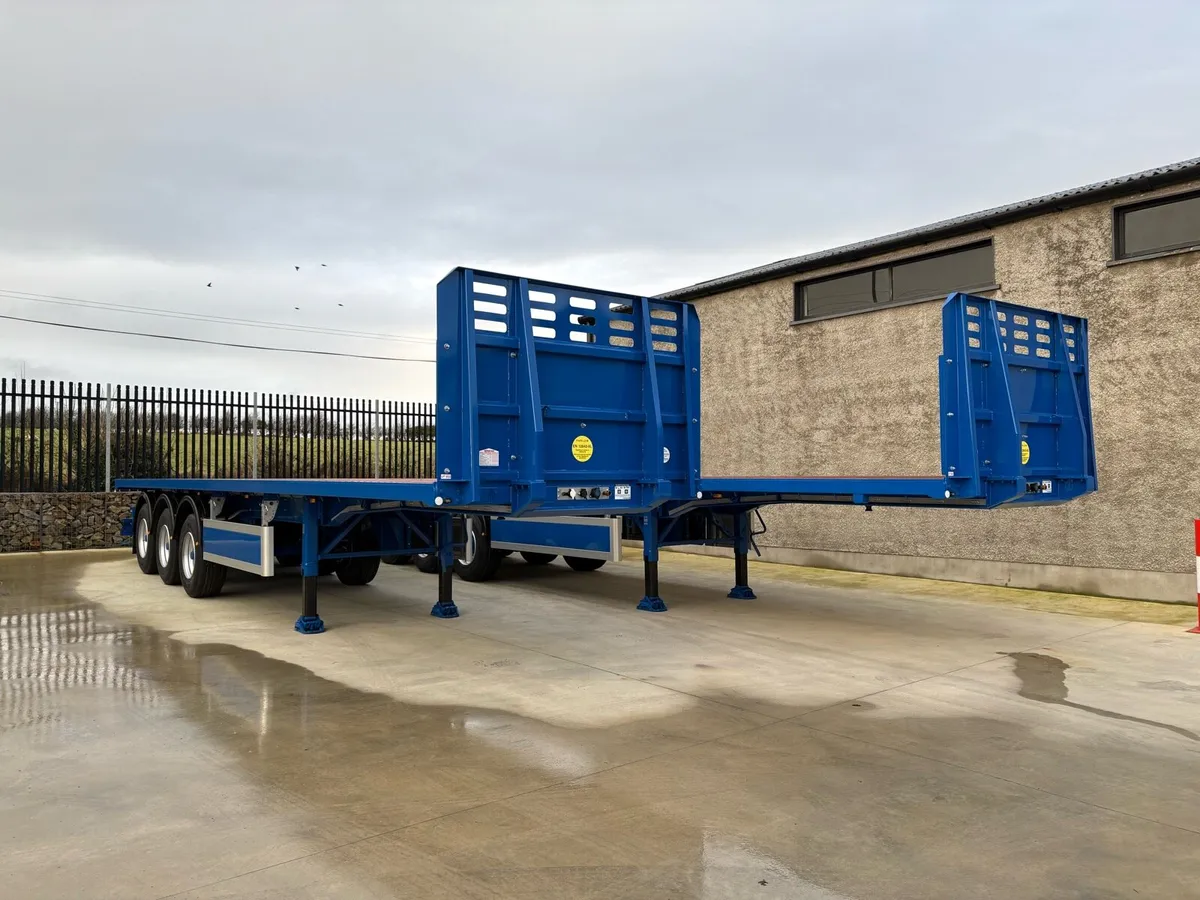 New Unused 37 ft Moffett Mounty Flat Trailer - Image 1