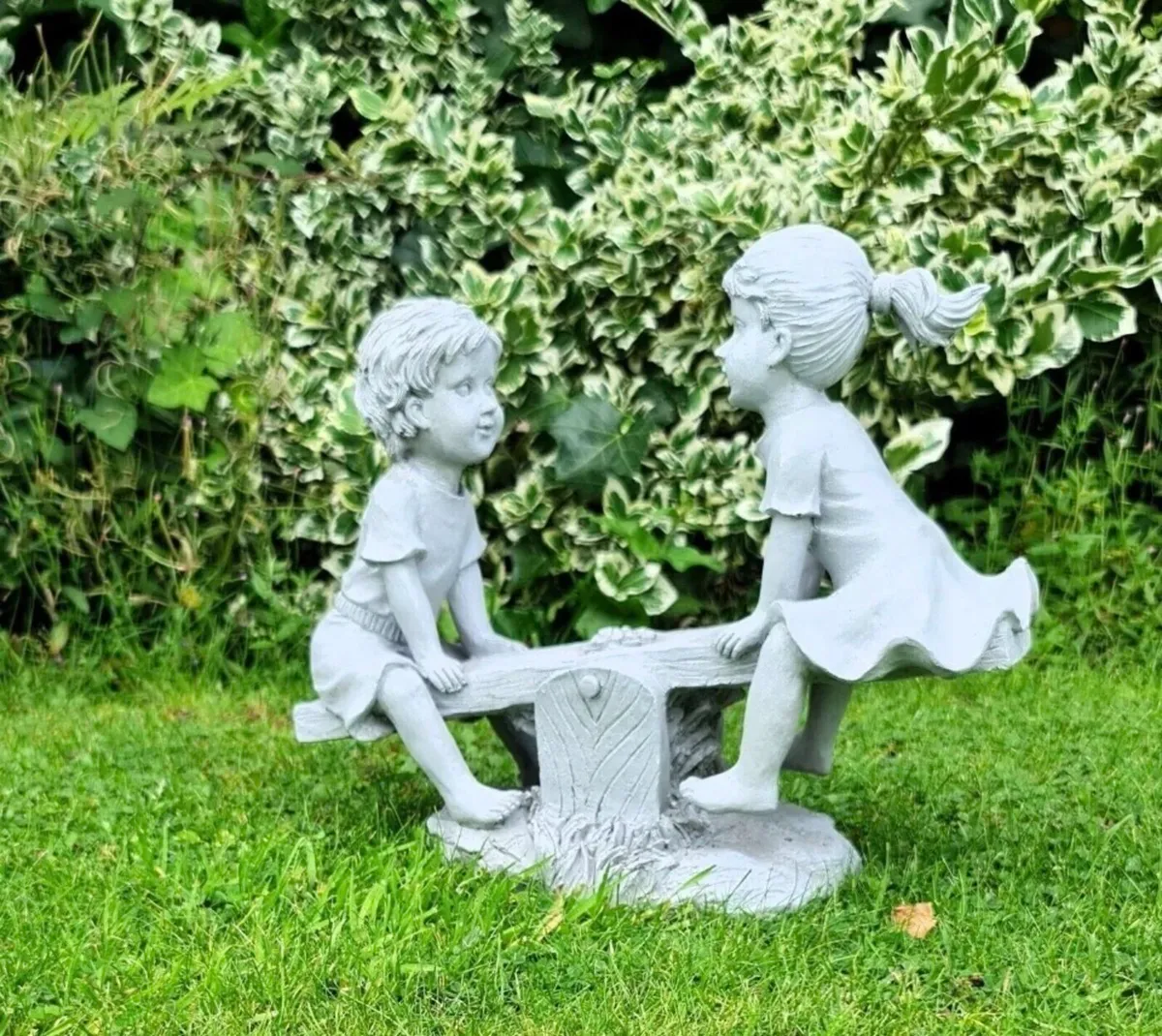 Garden Ornament Boy and Girl Seesaw Stone Effect - Image 1