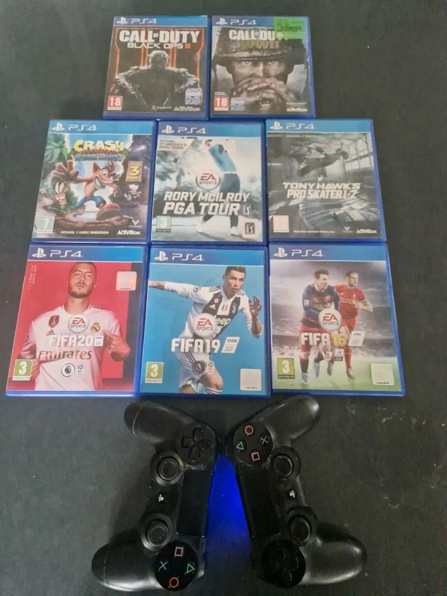 PS4 with games + 2 controllers + charging station - Image 4