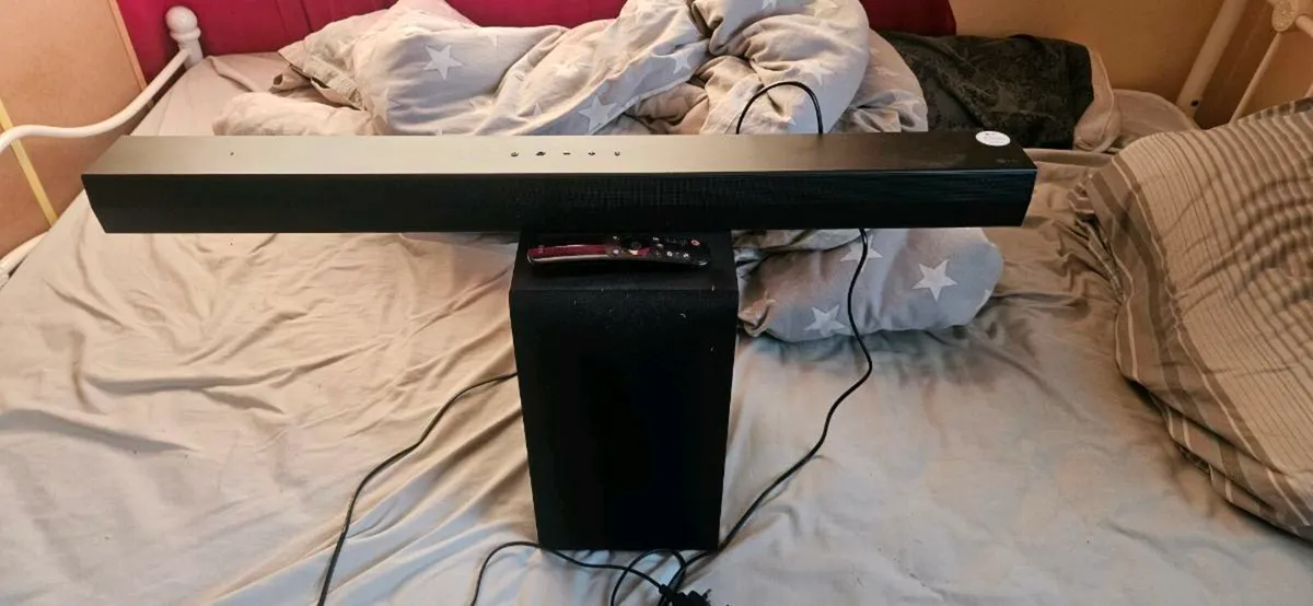 LG SOUNDBAR AND SUBWOOFER - Image 1