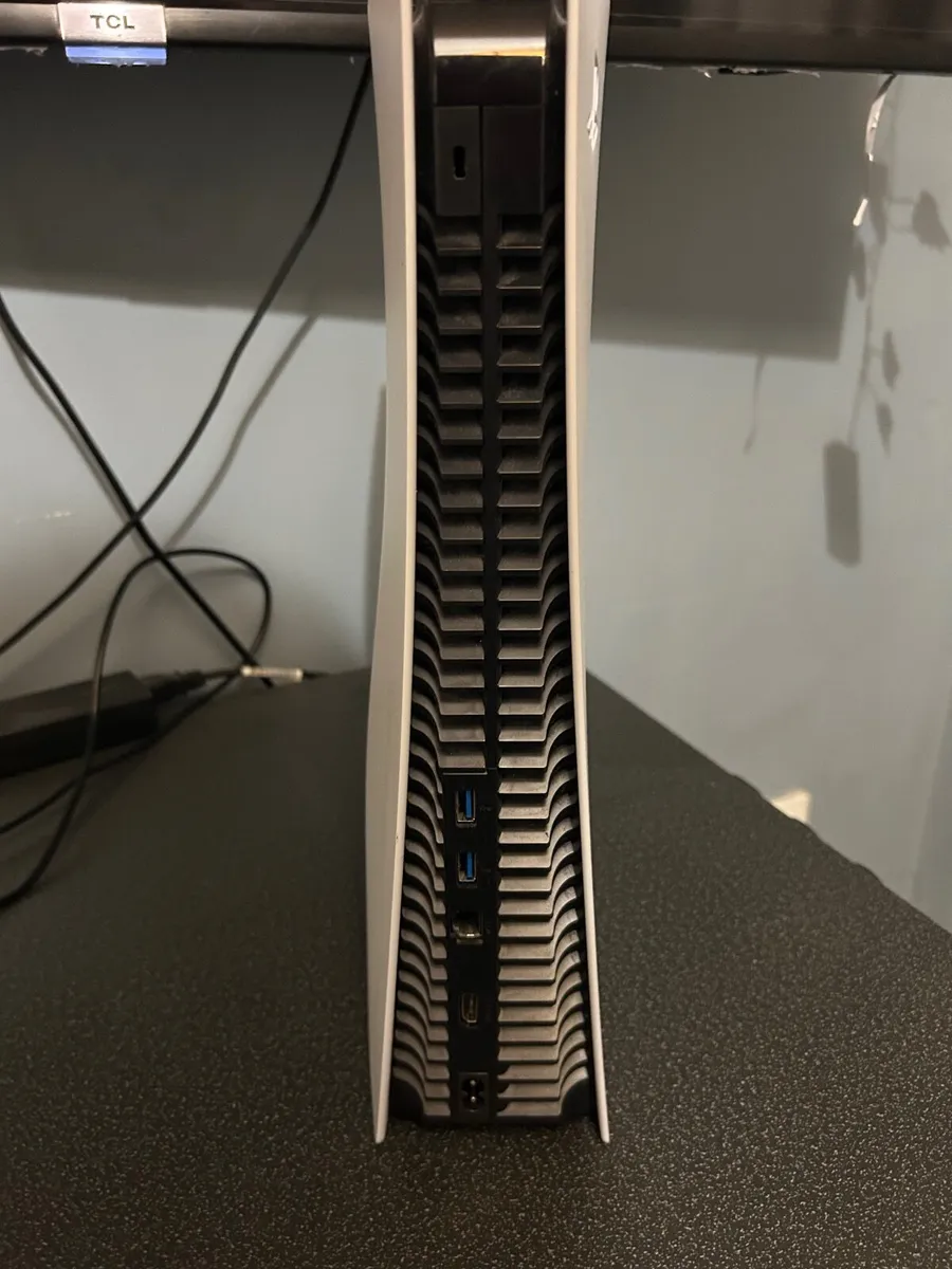 PS5 with two controllers - Image 4