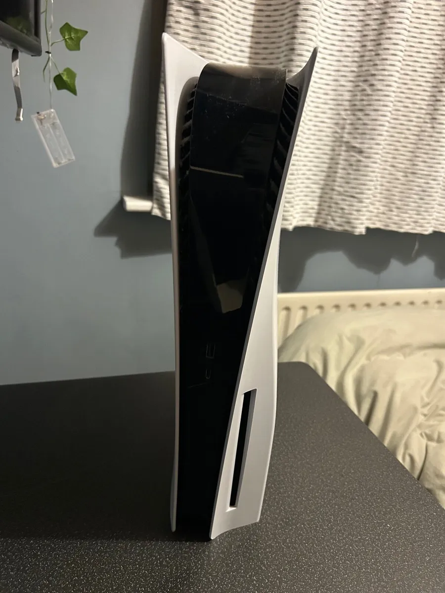 PS5 with two controllers - Image 3