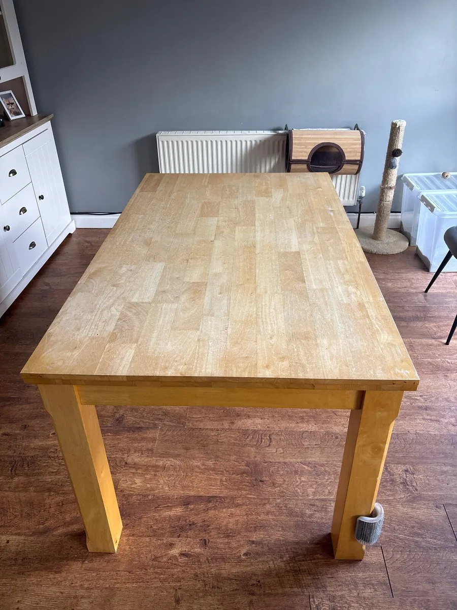 Used solid wood dining table - Image 1
