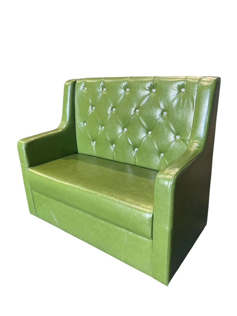8 Green leather couches.