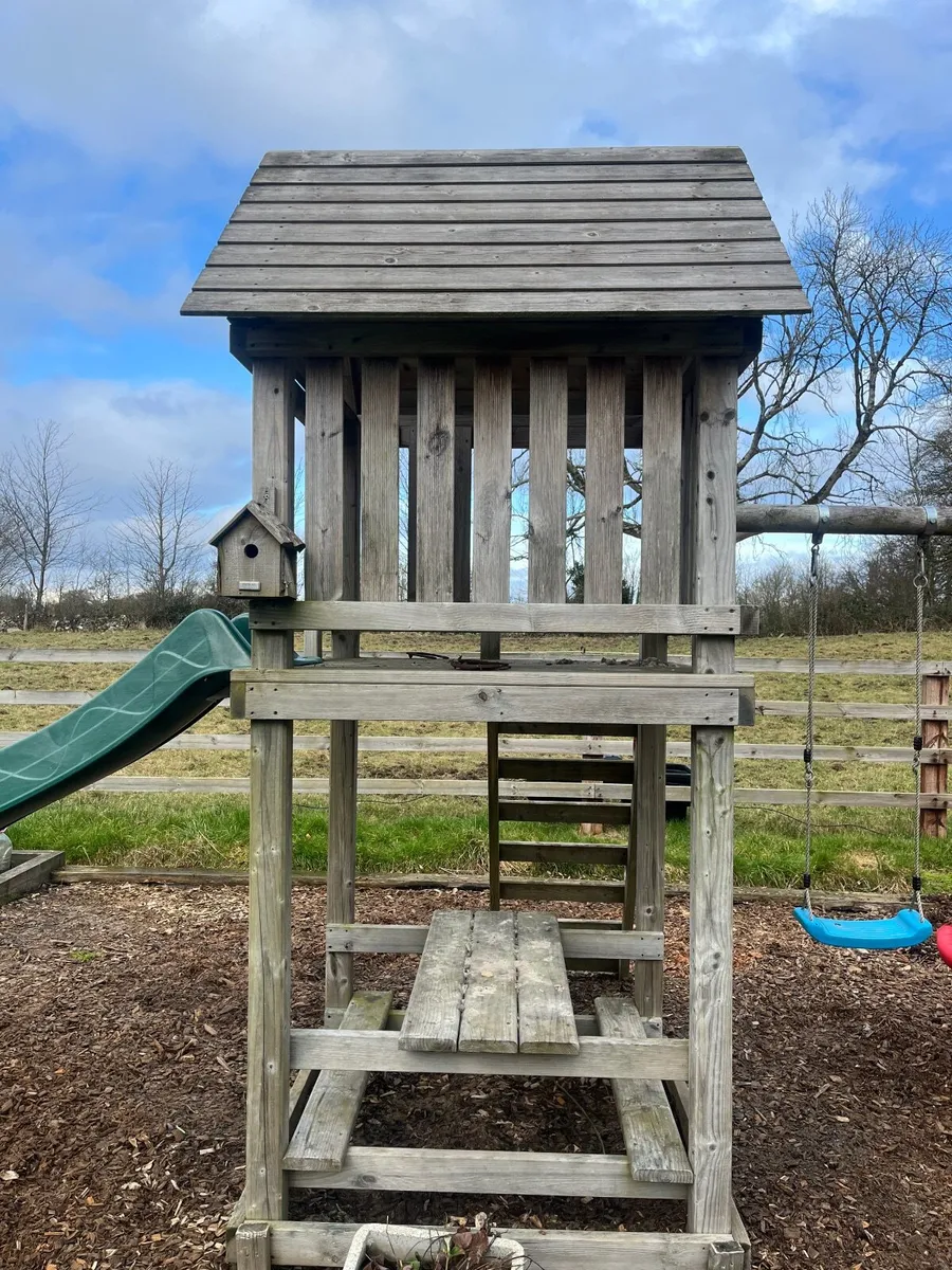 Outdoor playhouse with swing/slide - Image 1