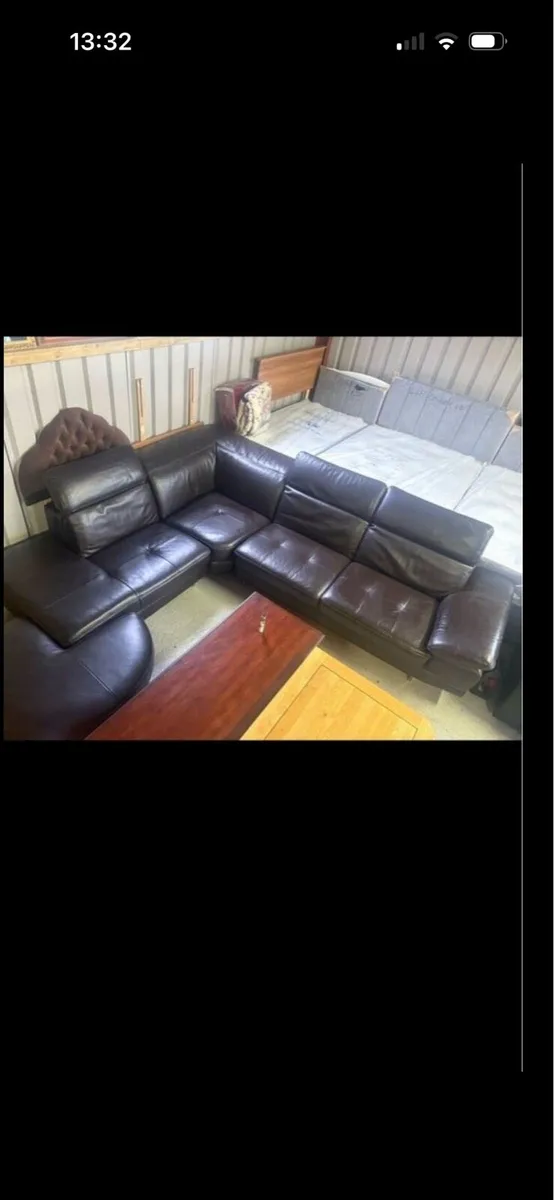 Leather corner couch with footstool