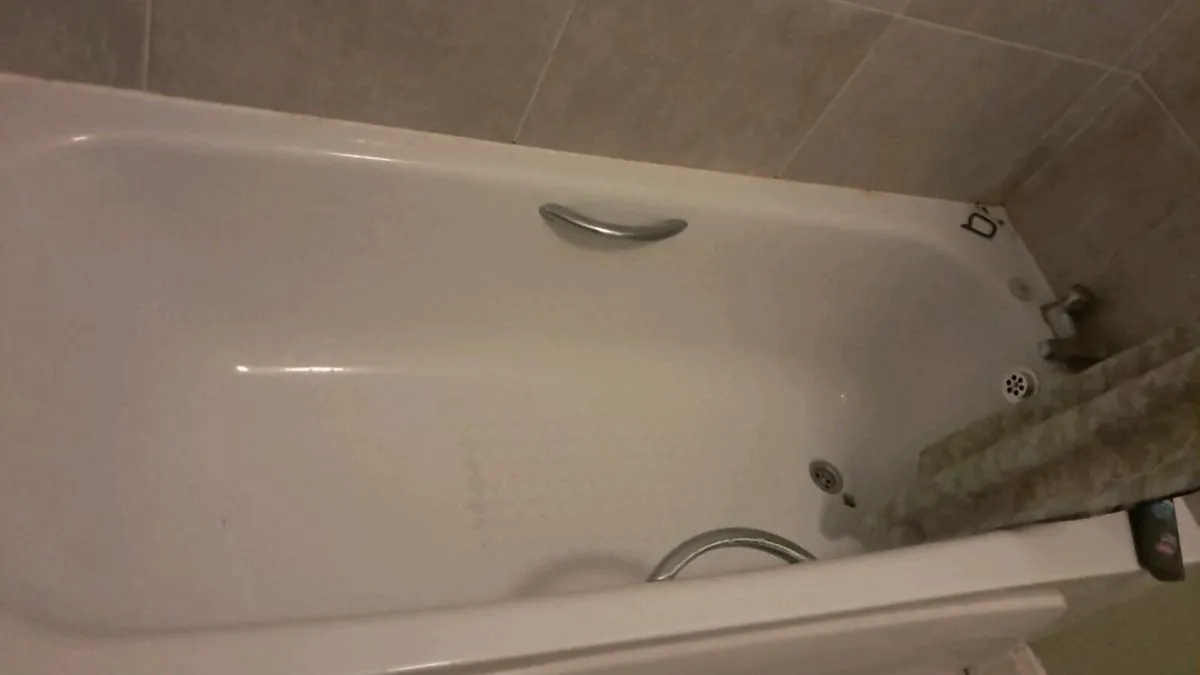 Bath with taps