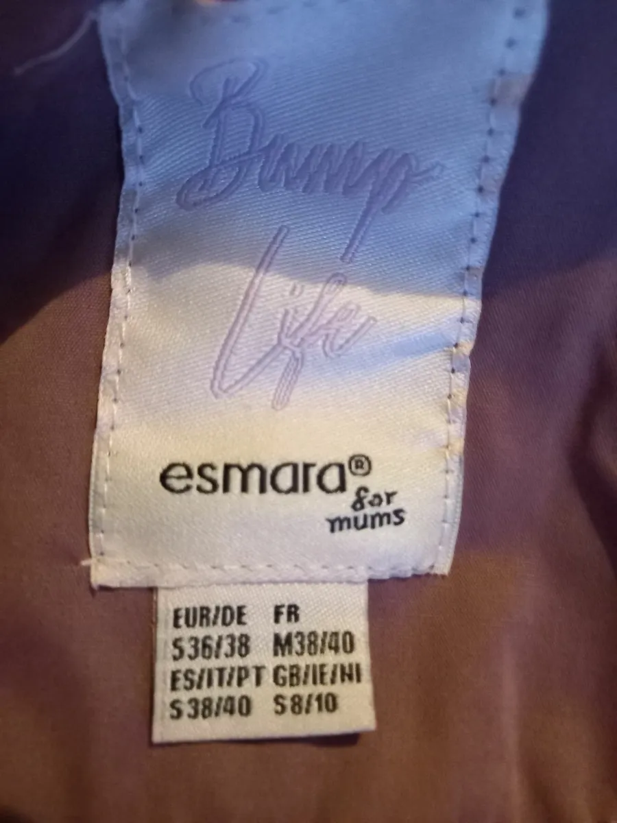 Pregnancy and baby wearing winter coat - Image 1