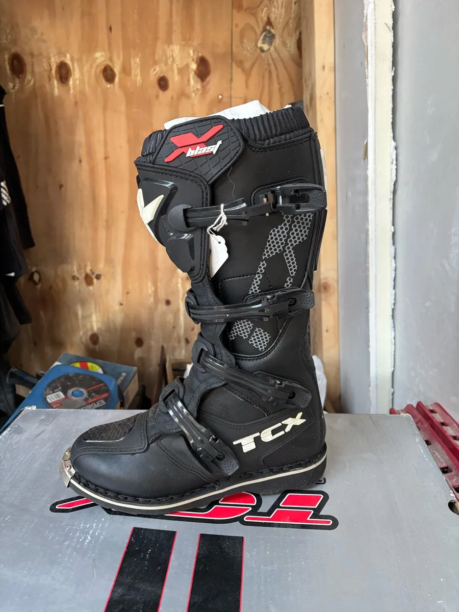 Motocross boots and clothing - Image 1