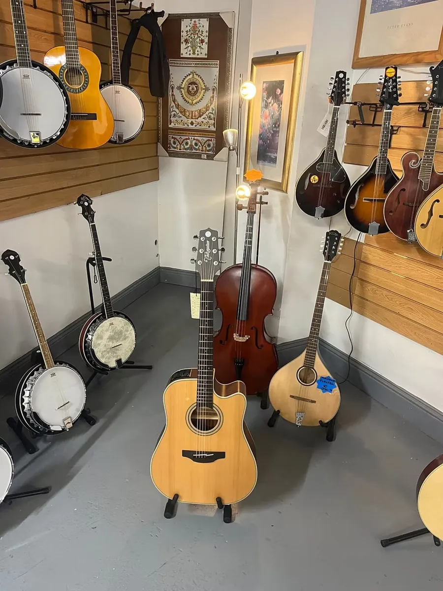 TAKAMINE NATURAL SEMI-ACOUSTIC GUITAR - Image 1