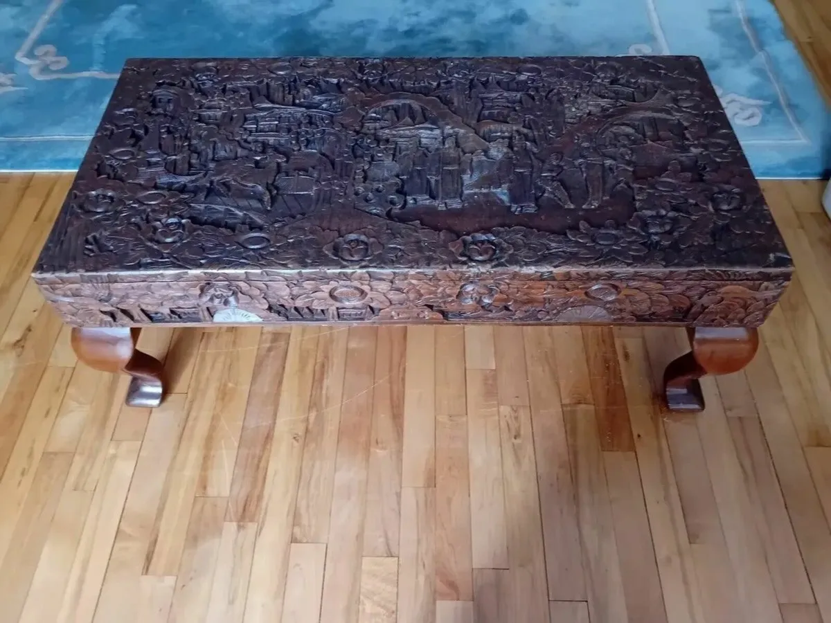 Hand carved wooden table