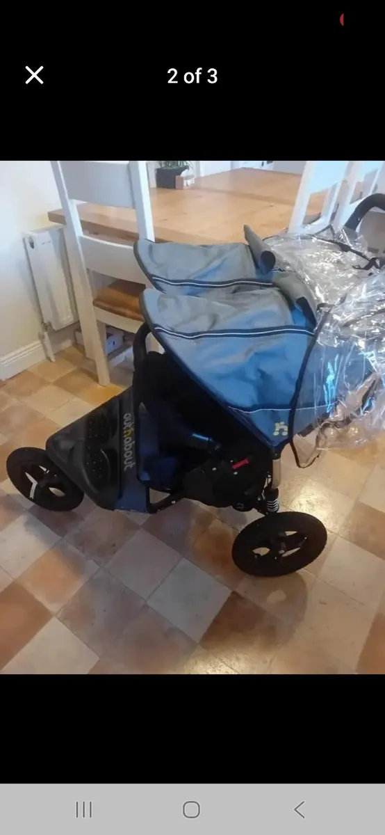 Out and about Nipper double buggy with a rain cove - Image 2