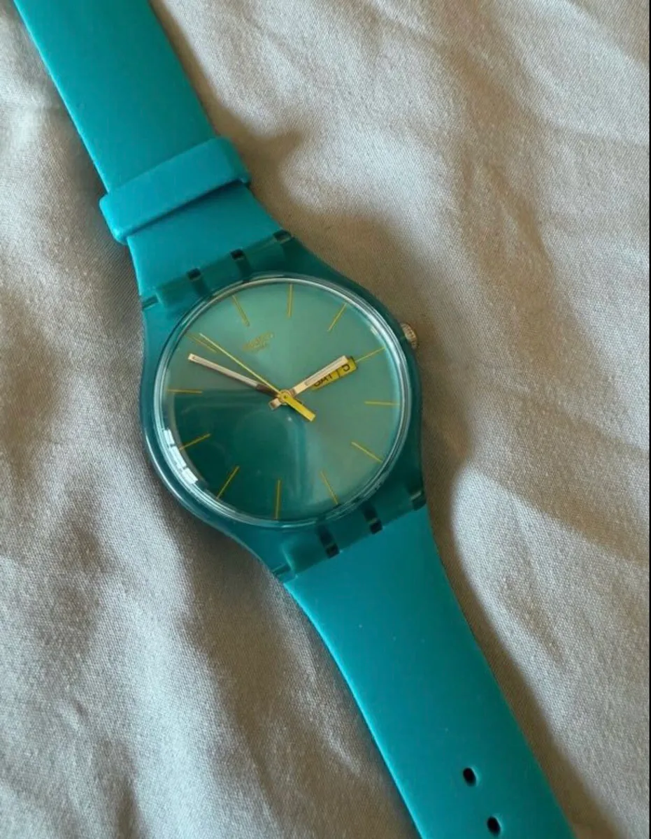Swatch watch unisex turquoise rebel, like new - Image 1