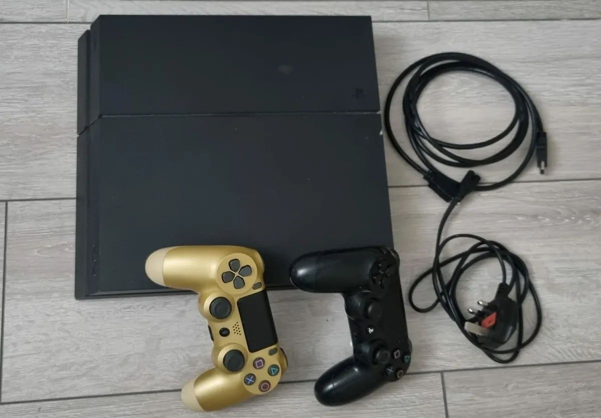 Playstation 4 with 2 controllers and Spiderman - Image 1
