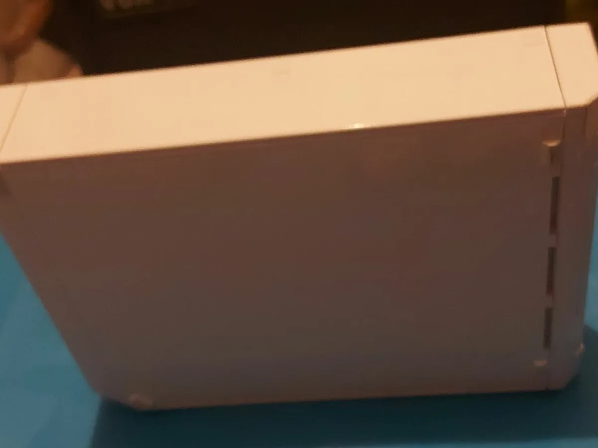 Nintendo Wii, Power Adaptor, and video cable - Image 1